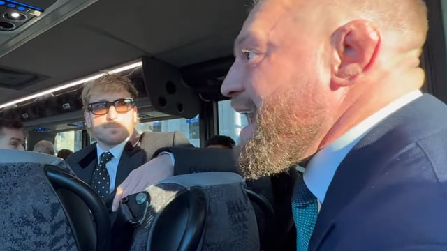 Conor McGregor talking to Logan Paul on bus
