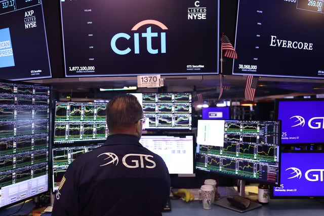 Traders work on the floor of the New York Stock Exchange during morning trading in New York City on Jan. 22, 2025