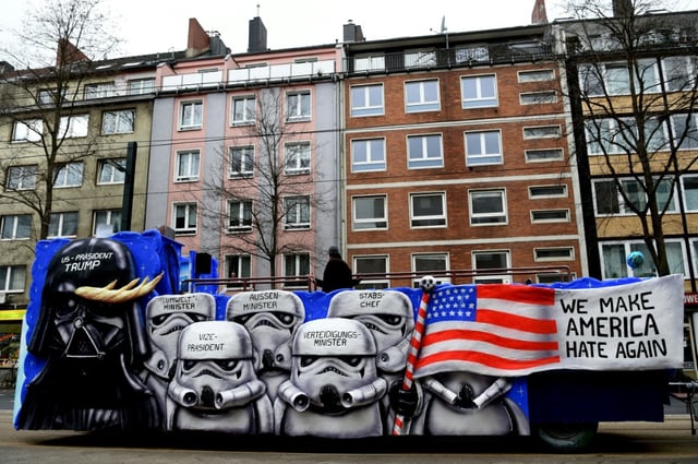 A carnival float depicting Star wars character Darth Vader as US President Donald Trump and his cabinet as Imperial Army Trooper takes part in the traditional "Rose Monday" carnival parade in Duesseldorf, western Germany on February 27, 2017