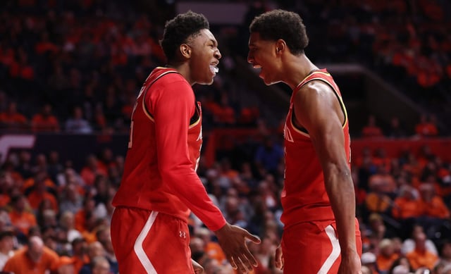 CHAMPAIGN, ILLINOIS - JANUARY 23: Derik Queen #25 and Julian Reese #10 of the Maryland Terrapins celebrate a basket against the Illinois Fighting Illini during the second half at State Farm Center on January 23, 2025 in Champaign, Illinois.  (Photo by Michael Reaves/Getty Images)