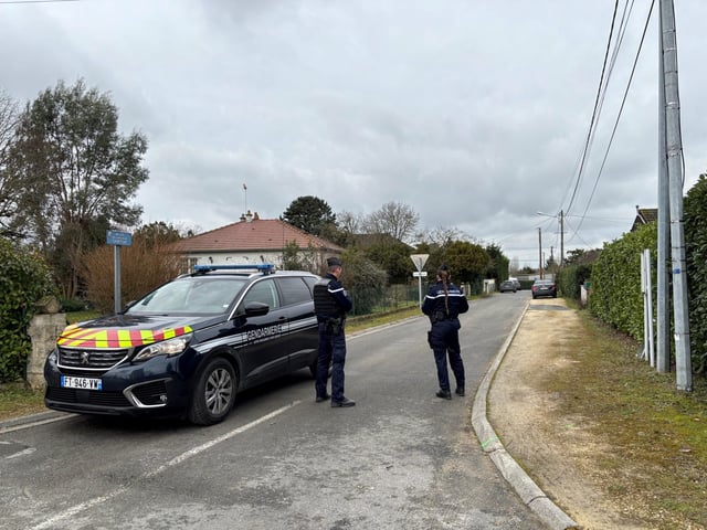 French gendarmes stand alert on a street in Mereau, near Vierzon, central France on January 23, 2025, as they secure the area following the kidnapping of David Ballard.