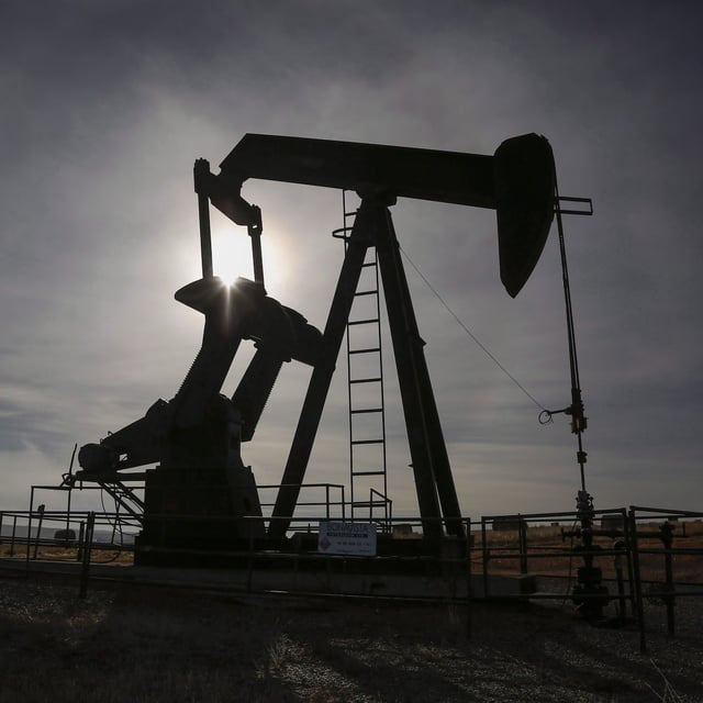 A pumpjack works at a well head on an oil and gas installation near Cremona, Alta., Saturday, Oct. 29, 2016.Calfrac Well Services Ltd. says it is suspending any investments in Russia. THE CANADIAN PRESS/Jeff McIntosh