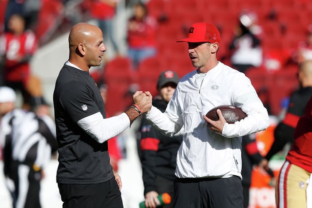 Head coach Kyle Shanahan of the San Francisco 49ers talks to then-defensive coordinator Robert Saleh during the warmup before the game against the Atlanta Falcons at Levi&#39;s Stadium on Dec. 15, 2019, in Santa Clara, Calif.