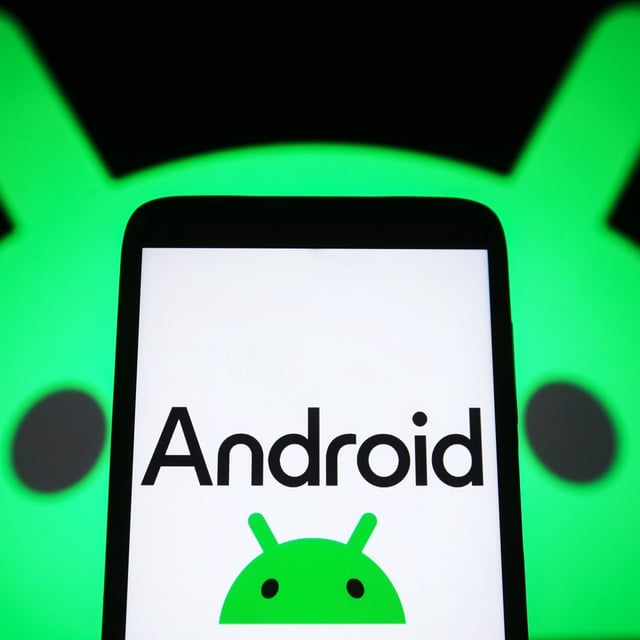 android logo on a phone with the logo behind the phone as well