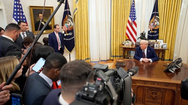 President Trump takes questions Thursday in the Oval Office. Photo: Yuri Gripas/Abaca/Bloomberg via Getty Images