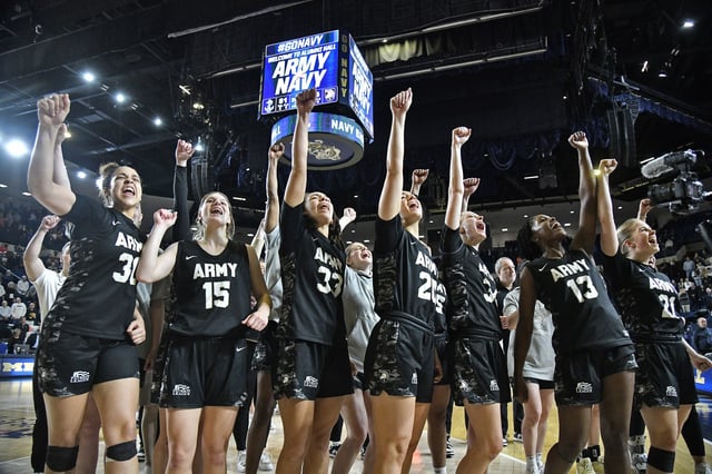 Army shouts xe2x80x9cBeat Navyxe2x80x9d after the win and playing of the West Point alma mater. The visiting Army Black Knights played the Navy Midshipmen in NCAA womenxe2x80x99s basketball Saturday at Alumni Hall in Annapolis. (Paul W. Gillespie/Staff photo)