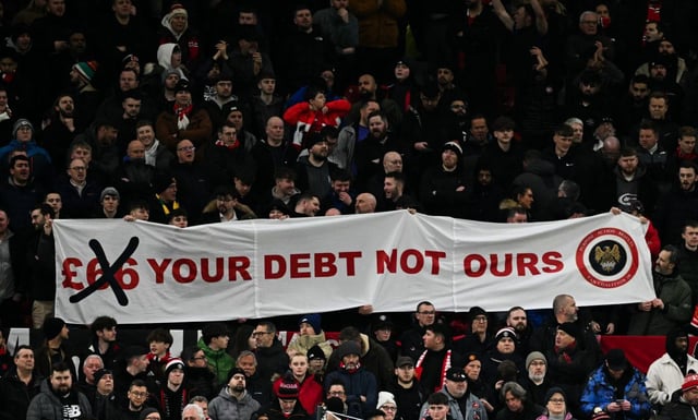 United fans protested during the away win over Fulham on Sunday (Photo: Getty)