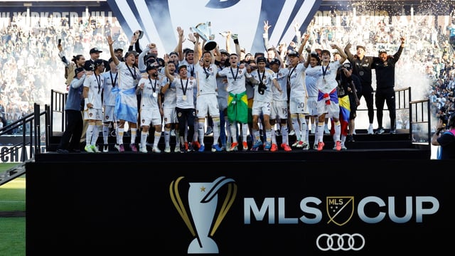 The Los Angeles Galaxy celebrate with the trophy after winning the 2024 MLS Cup Final.