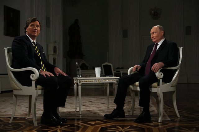 Russia&#39;s President Vladimir Putin gives an interview to US talk show host Tucker Carlson at the Kremlin in Moscow on February 6, 2024.