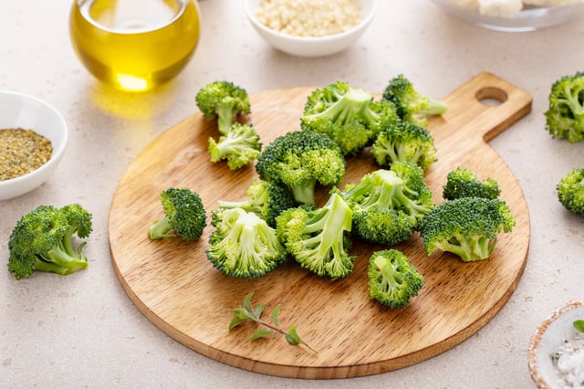 Broccoli florets on a chopping board