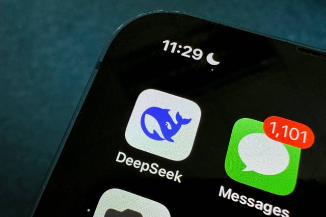 This photo illustration shows the DeepSeek app on a mobile phone in Beijing on January 27, 2025. Chinese firm DeepSeek's artificial intelligence chatbot has soared to the top of the Apple Store's download charts, stunning industry insiders and analysts with its ability to match its US competitors. (Photo by GREG BAKER / AFP) (Photo by GREG BAKER/AFP via Getty Images)