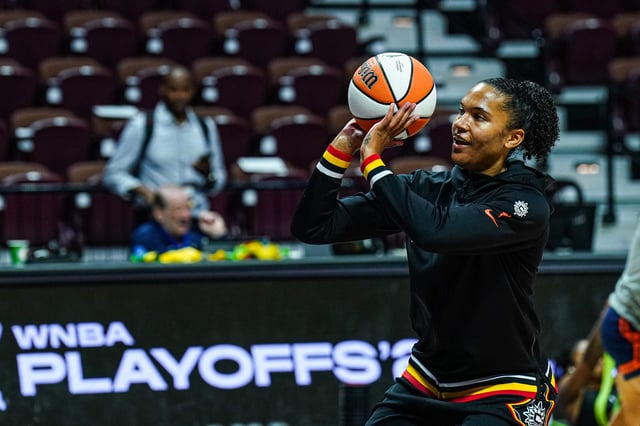 Forward Alyssa Thomas warms up before a WNBA playoff game between the Connecticut Sun and Minnesota Lynx on Oct 6, 2024.