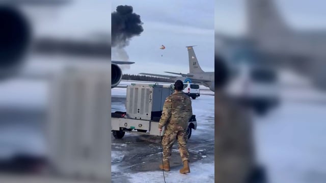 A pilot’s open parachute is seen after they escaped safely following an F-35 fighter jet crash during a training exercise at Eielson Air Force Base in Alaska on Tuesday.