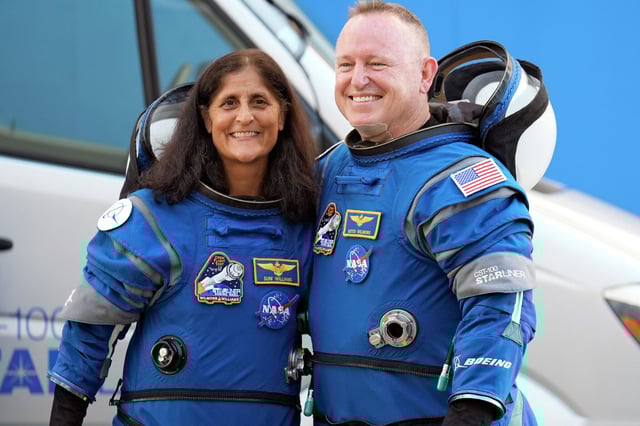 NASA astronauts Suni Williams, left, and Butch Wilmore stand together for a photo before heading to the launch pad Wednesday, June 5, 2024, in Cape Canaveral, Fla., for their liftoff on the Boeing Starliner capsule to the International Space Station.
