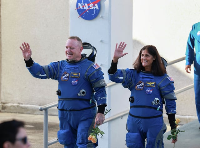 NASA’s Boeing Crew Flight Test Commander Butch Wilmore, left, and Pilot Suni Williams walk out of the Operations and Checkout Building on June 5, 2024, in Cape Canaveral, Fla. The astronauts are heading to Boeing’s Starliner spacecraft, which sits atop a United Launch Alliance Atlas V rocket, for NASA’s Boeing Crew Flight Test to the International Space Station. (Photo by Joe Raedle/Getty Images)