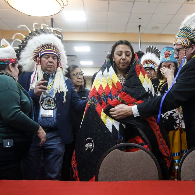Kyra Wilson takes part in a ceremony after the Assembly of Manitoba Chiefs (AMC) select her as grand chief in Winnipeg, Wednesday, Jan. 29, 2025. First Nations leaders selected a new head for the AMC after the sudden death of Cathy Merrick last year. THE CANADIAN PRESS/John Woods