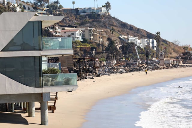 A mixture of burned and untouched homes during aftermath of Palisades Fire along the Pacific Coast Highway in Malibu on Jan. 12.