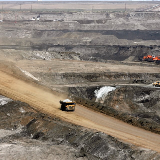 A portion of the Shell Albian Sands oilsands mine  is seen from an overlook near Fort McMurray, Alta., Wednesday, July 9, 2008. THE CANADIAN PRESS/Jeff McIntosh