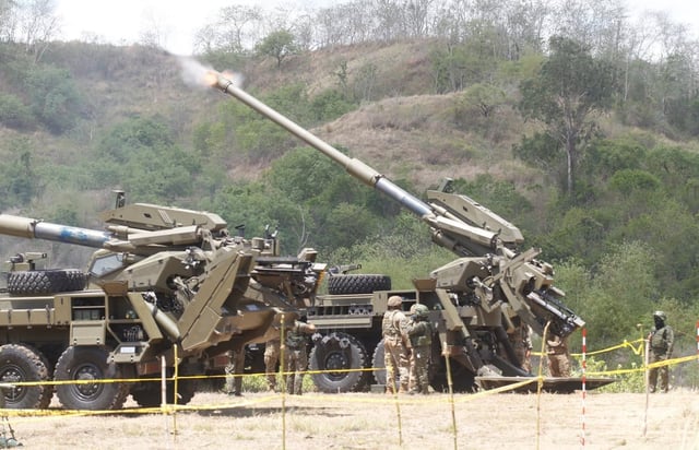 American and Filipino soldiers fire an ATMOS 155mm Howitzer during as part of US-Philippines army-to-army joint drills on April 26, 2024, in Laur, Nueva Ecija province, Philippines. Photo: Jeoffrey Maitem