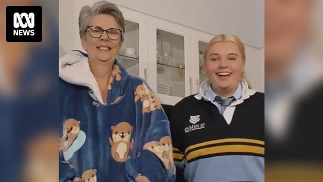 A mother and daughter named Jennifer and Gretl Petelczyc smiling happily in a photo.