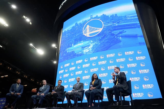 Golden State Warriors President &amp; Chief Operating Officer Brandon Schneider, right, speaks during a news conference announcing that the 2025 NBA All-Star Game will be played at the Chase Center in San Francisco with broadcaster Bonta Hill, from left, Warriors Co-Executive Chairman &amp; Chief Executive Officer Joe Lacob, Warriors Chairman Peter Guber, NBA Commissioner Adam Silver and San Francisco Mayor London Breed in San Francisco,  Nov. 6, 2023. 