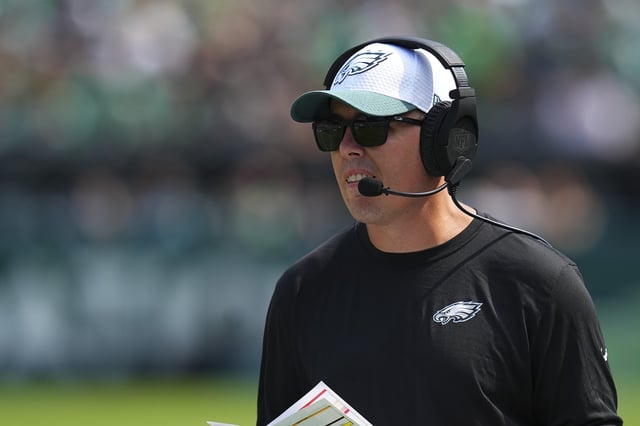 PHILADELPHIA, PENNSYLVANIA - AUGUST 24: Offensive coordinator Kellen Moore of the Philadelphia Eagles looks on against the Minnesota Vikings during the preseason game at Lincoln Financial Field on August 24, 2024 in Philadelphia, Pennsylvania. The Vikings defeated the Eagles 26-3.