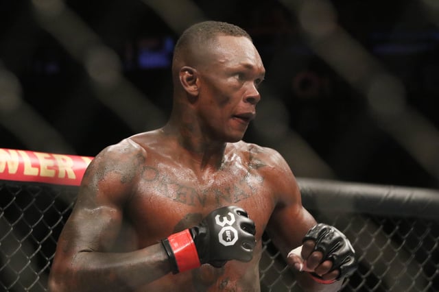 Israel Adesanya reacts during his fight with Sean Strickland (not pictured) in UFC 293 at Qudos Bank Arena.