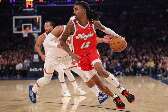 Jan 27, 2025; New York, New York, USA; Memphis Grizzlies guard Ja Morant (12) dribbles during the second half in front of New York Knicks guard Josh Hart (3) at Madison Square Garden. Mandatory Credit: Vincent Carchietta-Imagn Images/File Photo