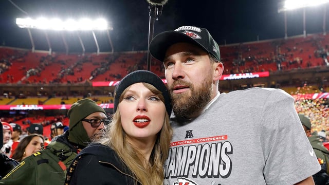 Taylor Swift celebrates with Travis Kelce #87 of the Kansas City Chiefs after defeating the Buffalo Bills 32-29 in the AFC Championship Game at GEHA Field at Arrowhead Stadium on January 26, 2025 in Kansas City.