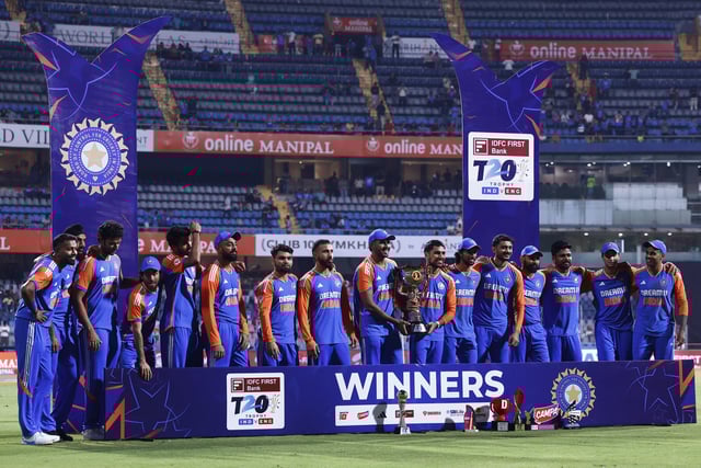 Cricket - Fifth T20 International - India v England - Wankhede Stadium, Mumbai, India - February 2, 2025 India players lift the trophy and celebrate after winning the t20 series REUTERS/Anushree Fadnavis