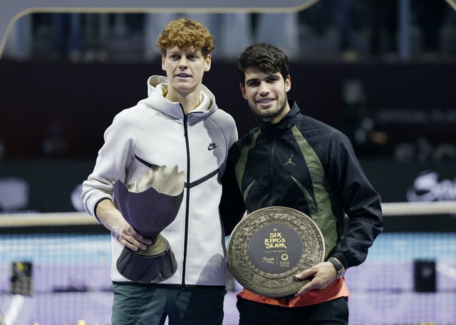 Tennis - 6 Kings Slam - Riyadh, Saudi Arabia - October 19, 2024 Italy's Jannik Sinner posses with the trophy after winning the final alongside Spain's Carlos Alcaraz REUTERS/Hamad I Mohammed/File Photo