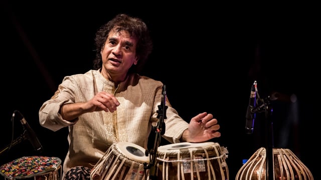 Ustad Zakir Hussain's exclusion from Grammys' In Memoriam section sparks outrage.