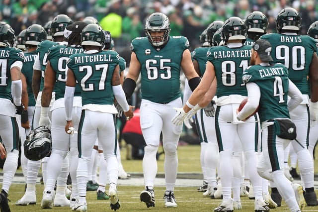 Jan 26, 2025; Philadelphia, PA, USA; Philadelphia Eagles offensive tackle Lane Johnson (65) during the player introductions against the Washington Commanders in the NFC Championship game at Lincoln Financial Field. Mandatory Credit: Eric Hartline-Imagn Images