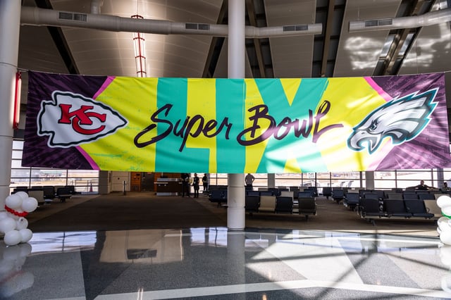Feb 2, 2025; Kenner, LA, USA; Detailed view of the Super Bowl signage before the Philadelphia Eagles arrive at Louis Armstrong New Orleans International Airport. Mandatory Credit: Stephen Lew-Imagn Images