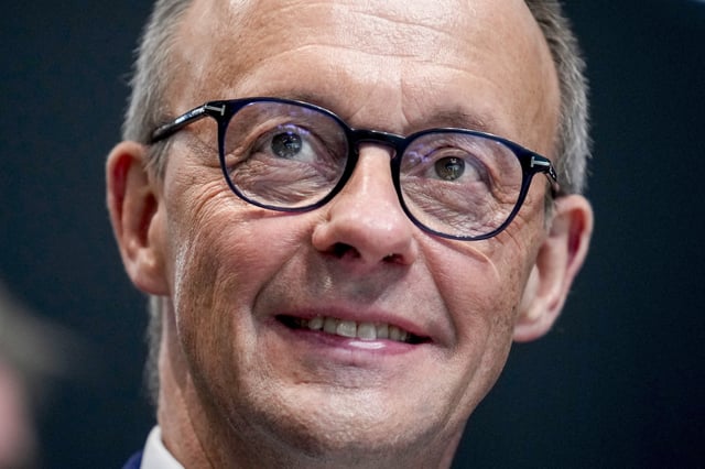 Friedrich Merz, CDU candidate for chancellor and CDU federal chairman, right, attends the 37th federal party conference of the CDU in Berlin, Germany, Monday, Feb.3, 2025. (AP Photo/Ebrahim Noroozi)