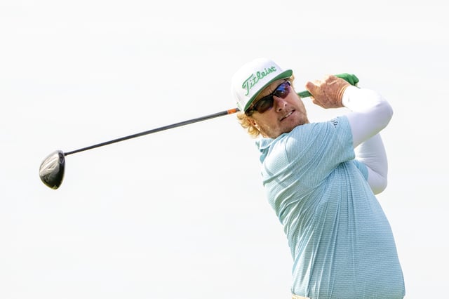 January 9, 2025; Honolulu, Hawaii, USA; Charley Hoffman hits his tee shot on the 14th hole during the first round of the Sony Open golf tournament at Waialae Country Club. Mandatory Credit: Kyle Terada-Imagn Images/File Photo