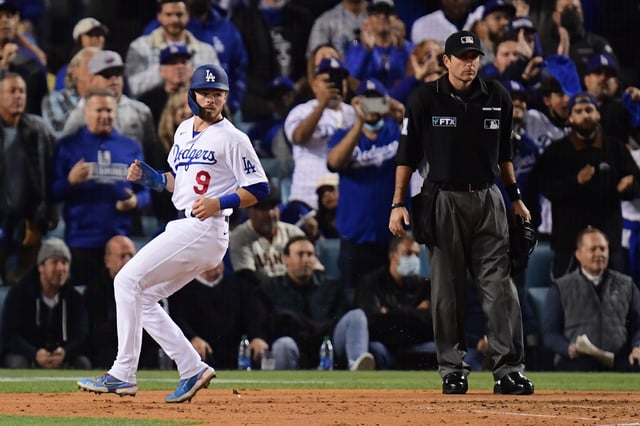 Pat Hoberg, right, was an umpire during the 2021 National League Division Series between the Los Angeles Dodgers and SanFrancisco Giants.