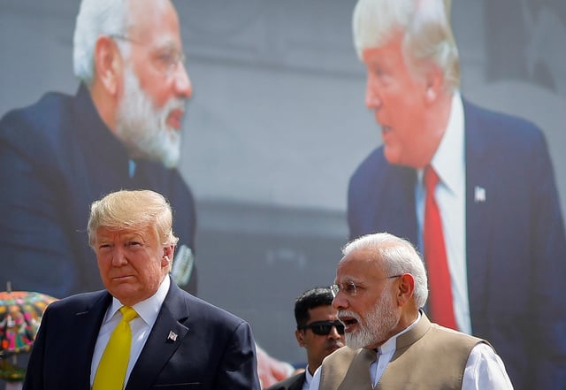 U.S. President Donald Trump and Indian Prime Minister Narendra Modi speak during the welcoming ceremony, as Trump arrives at Sardar Vallabhbhai Patel International Airport in Ahmedabad, India February 24, 2020. REUTERS/Al Drago/ File Photo