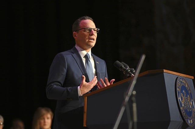 Pennsylvania Gov. Josh Shapiro speaks at the swearing-in ceremony of state Treasurer Stacy Garrity for her second four-year term in the Forum Auditorium across the street from the Capitol, Jan. 21, 2025, in Harrisburg, Pa. (AP Photo/Marc Levy)