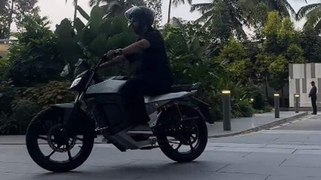Bhavish Aggarwal, CEO of Ola Electric riding the Roadster electric motorcycle.