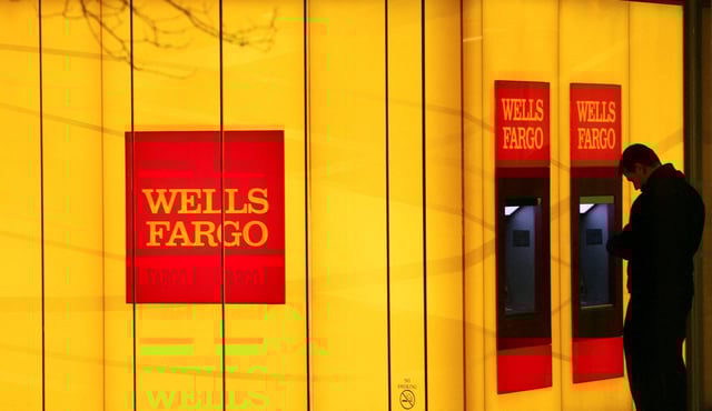 A Wells Fargo branch is seen in New York City, U.S., March 17, 2020. REUTERS/Jeenah Moon/File Photo