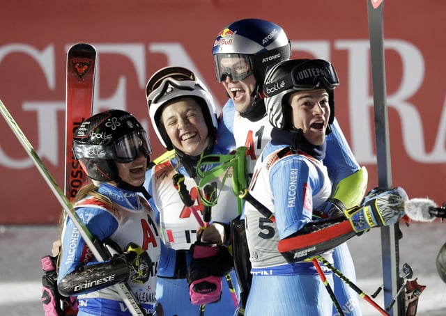 Alpine Skiing - FIS Alpine World Ski Championships - Team Parallel - Saalbach, Austria - February 4, 2025 Italy's Lara Della Mea, Alex Vinatzer,  Giorgia Collomb and Filippo Della Vite react the big final against Switzerland REUTERS/Leonhard Foeger