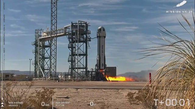 The New Shepard vehicle developed by billionaire Jeff Bezos' Blue Origin to fly cargo and humans on short trips to the edge of space prepares to launch Tuesday from West Texas. In a first, the spacecraft's capsule successfully rotated mid-flight in a maneuver to mimic lunar gravity.
