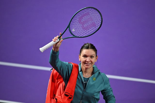 Simona Halep waves to the crowd at the end of a match during Transylvania Open in Cluj-Napoca, Romania, February 4, 2024. Inquam Photos/Alex Nicodim via REUTERS