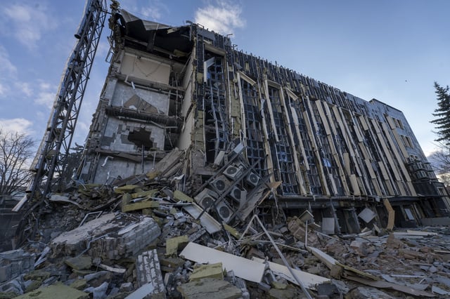 The City Hall is seen damaged following Russian rocket attack that killed and injured a number of people in Izium, Ukraine, Tuesday, Feb. 4, 2025. (AP Photo/Andrii Marienko)