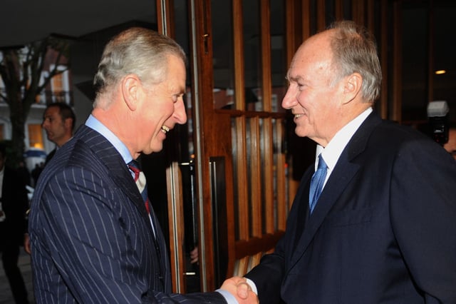 King Charles III shakes hands with Aga Khan during a visit to the Ismaili Centre,  in London, England, on its 25th anniversary on November 18, 2010.