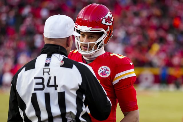 Kansas City Chiefs quarterback Patrick Mahomes talks with a referee prior to the AFC Championship game against the Buffalo Bills on Jan. 26, 2025.