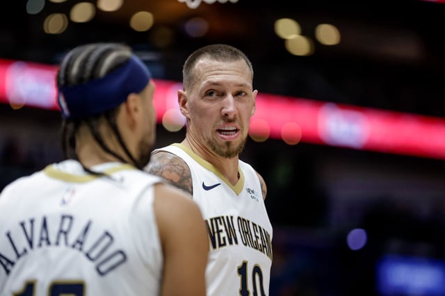 Daniel Theis #10 of the New Orleans Pelicans talks with Jose Alvarado #15 during the second half of a preseason game against the Orlando Magic at the Smoothie King Center on October 7, 2024 in New Orleans, Louisiana.
