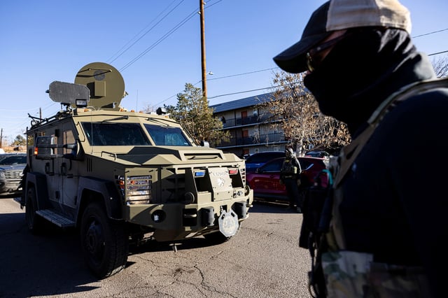 Federal agents, including Immigration & Customs Enforcement, FBI and HSI police conduct raids at Cedar Run apartment complex in Denver, Colorado, U.S., February 5, 2025. REUTERS/Kevin Mohatt