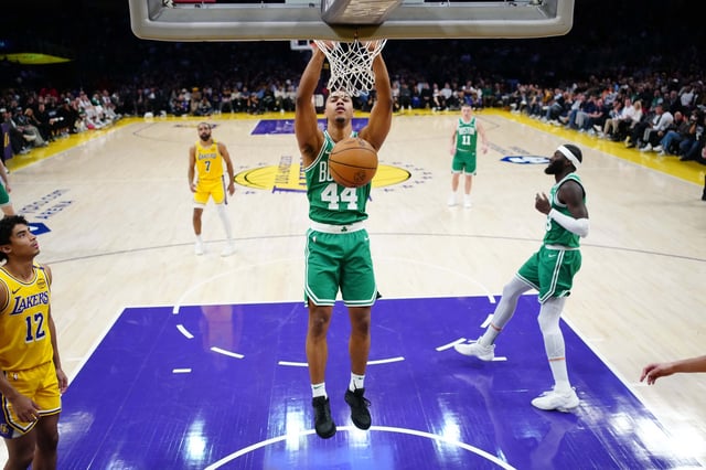 Jan 23, 2025; Los Angeles, California, USA; Boston Celtics guard Jaden Springer (44) dunks the ball against the Los Angeles Lakers in the second half at the Crypto.com Arena. Mandatory Credit: Kirby Lee-Imagn Images/File Photo